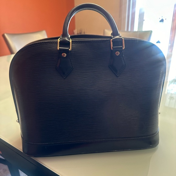 LOUIS VUITTON EPI ALMA MM HANDBAG and matching wallet - Picture 10 of 14